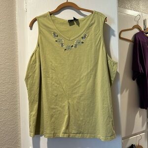 Green tank top with floral around neckline